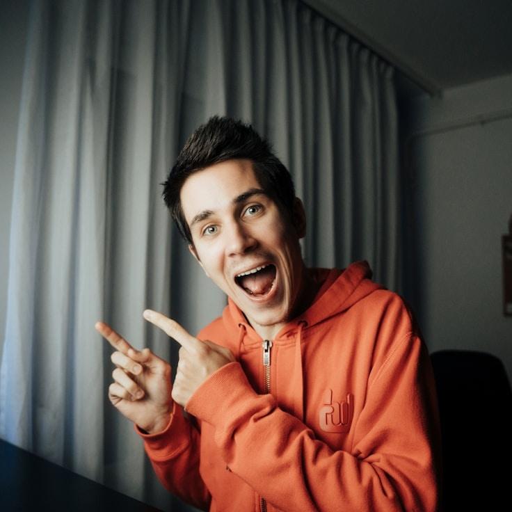 Aarya Sen, Lead Design Curator at Brisk Pine Cottage, reviewing corporate floral arrangements